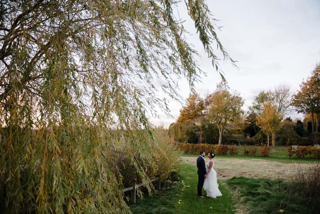 Couple in Rustic Wedding Gardens at South Farm
